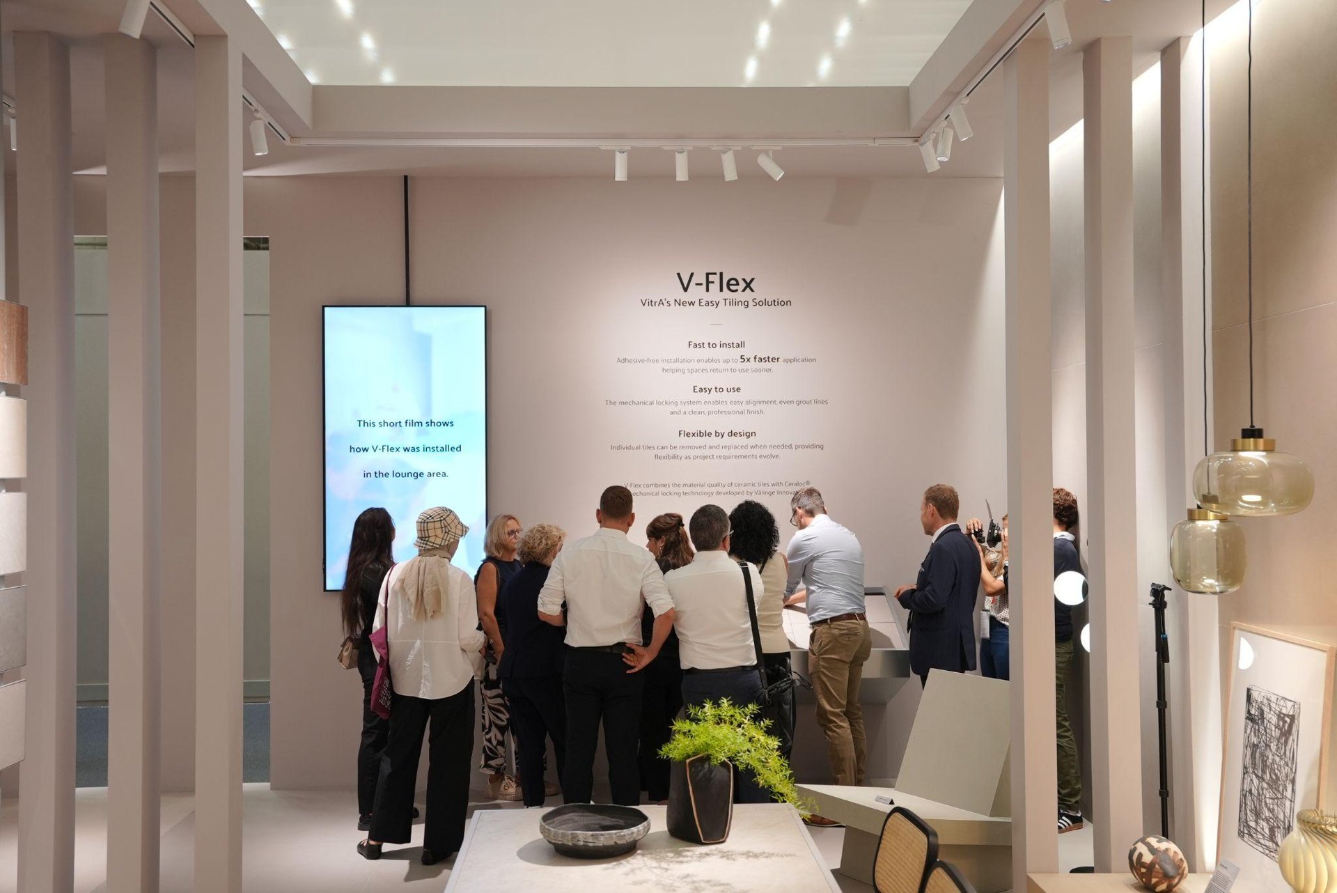 Visitors at the V-Flex installation display: Product News: VitrA Tiles Brings The Code and Updated Design Codes to Cersaie 2026