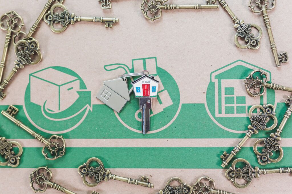 Why Washington’s Federal Funds Rate Matters to Mortgage Borrowing in Britain A collection of vintage keys with a modern house key symbolizing real estate investment.